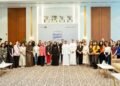 Hessa bint Essa Buhumaid with the third batch of licensed social professionals at Al Warqa Majlis in Dubai.