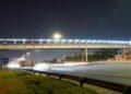 Pedestrian bridge in Dubai equipped with smart motion-sensor LED lighting.