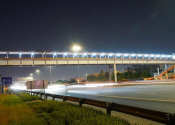 Pedestrian bridge in Dubai equipped with smart motion-sensor LED lighting.