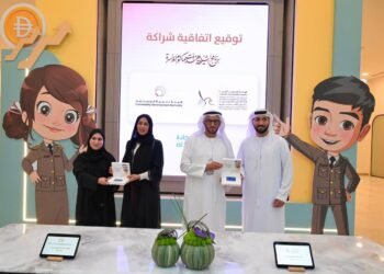 Lt. General Mohammed Ahmed Al Marri and Hessa Bint Essa Buhumaid signing the MoU at GDRFA Dubai headquarters.