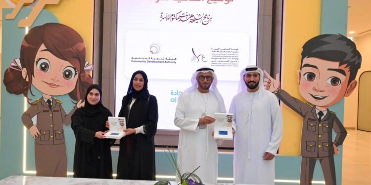 Lt. General Mohammed Ahmed Al Marri and Hessa Bint Essa Buhumaid signing the MoU at GDRFA Dubai headquarters.