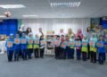 Her Highness Sheikha Bodour bint Sultan Al Qasimi presenting portable Arabic libraries to students and officials at Seri Bintang South National School in Malaysia.