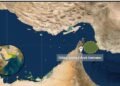 A commercial cargo vessel navigating international waters near the Gulf of Oman