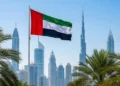 Sun shining brightly over the modern skyline of the United Arab Emirates during a hot summer day