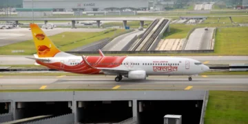 Traditional Onam Sadya presented in custom packaging on an Air India Express flight
