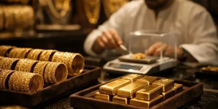 Gold bars and jewelry displayed in a retail store showcase in Dubai, UAE