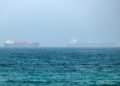 An oil tanker has been disabled off Ash Shishah, Oman, after an unidentified projectile hit its engine room. Crew reported safe as security alerts widen near Strait of Hormuz.