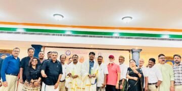 Presenting the Chiranthana Mohammed Rafi Award to Nawas Thekkada and Sreejish Sharada at Sharjah Indian Association Hall.