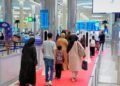 Passengers completing automated immigration clearance at Dubai Airport smart gates