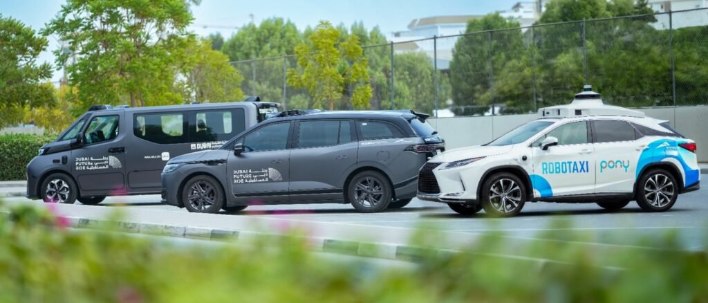 Baidu Apollo Go autonomous Robotaxi driving on a street in Dubai, UAE