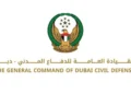 Dubai Civil Defence emergency vehicles parked near Sheikh Zayed Road during an emergency response.