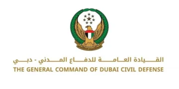 Dubai Civil Defence emergency vehicles parked near Sheikh Zayed Road during an emergency response.