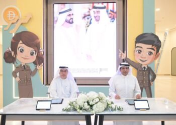 Officials signing a digital MoU agreement for labor welfare in Dubai