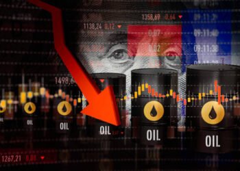 Graphic displaying crude oil price tickers falling to $83.43 per barrel on global commodities trading screens