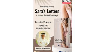 Author Ibrahim Ali Khadem during a book signing event for Sara's Letters at Kinokuniya Dubai Mall