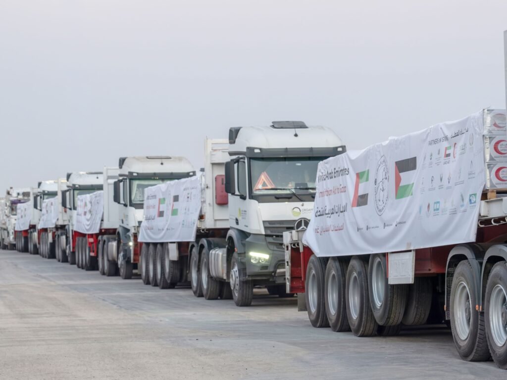 UAE humanitarian aid trucks prepared for Gaza at Al Arish logistics center.