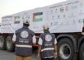 UAE humanitarian aid trucks prepared for Gaza at Al Arish logistics center.