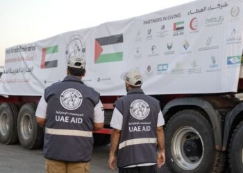 UAE humanitarian aid trucks prepared for Gaza at Al Arish logistics center.