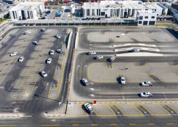 Dubai's RTA introduces an AI-powered Smart Test System for yard driving tests, featuring 2cm RTK tracking, auto-braking, and fully automated scoring.