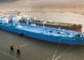 Supertanker freight rates jumped to an unprecedented $1.3 million a day as Iran shut the Strait of Hormuz, Oil Minister Paknejad stepped down, and oil prices rose.